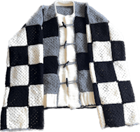 a black and white checkered knitted cardigan