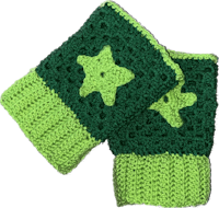 a pair of green and white crocheted wrist warmers